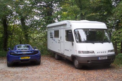 Bertie parked beside a McLaren at Berry Pomeroy